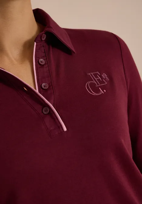 Koszulka Polo z długim rękawem i guzikami red wine Bordowa koszulka polo z długim rękawem, zapięciem na guziki i subtelnym monogramem na piersi.