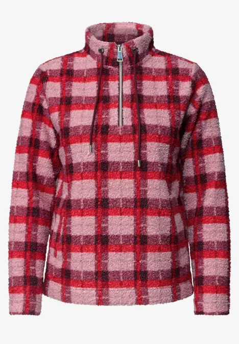 Roter-pinker kariertes Fleece-Jacke mit Stehkragen und Reißverschluss.