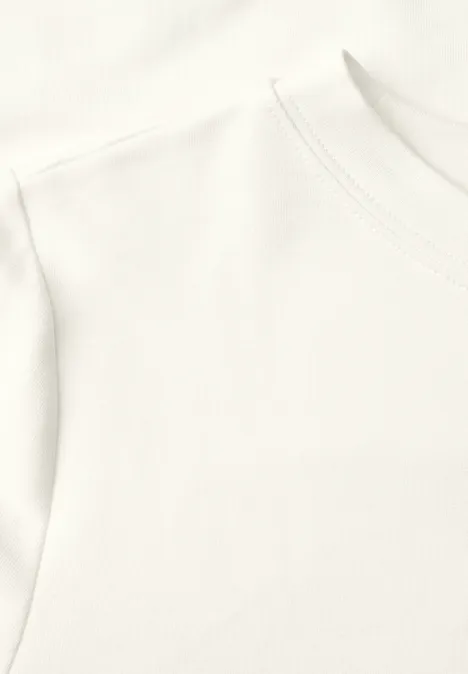 Langarm Shirt mit Tunnelzug am Saum vanilla white Nahaufnahme eines weißen T-Shirts mit feiner Stoffstruktur.
