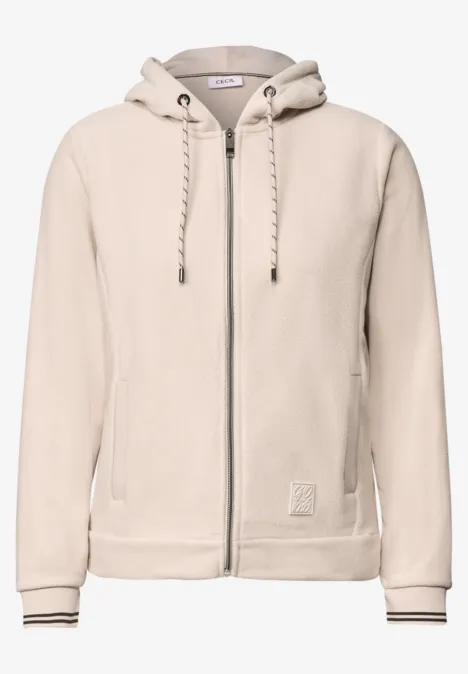 Langarm Fleece Jacke mit Kapuze cashmere beige Helles, sandbeiges Hoodie aus weichem Stoff mit Reißverschluss, Kapuze und Kordeln, seitlichen Taschen.