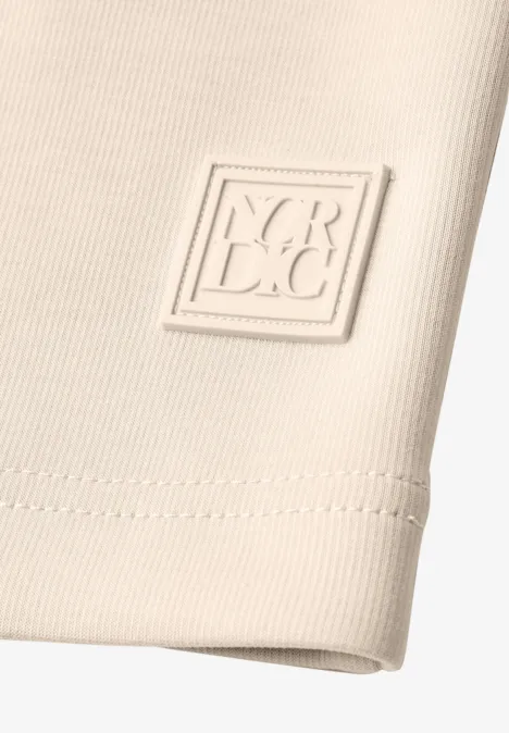 Shirt met lange mouwen, ronde hals en geribbelde structuur pearl beige Beiges, geripptes Textil mit eingenähter quadratischer Logo-Applikation 'NOR·C'.