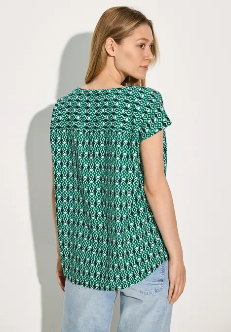 Bluse mit grafischem Muster fir green