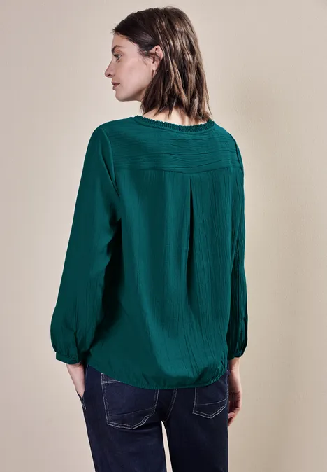 Bluse mit Smock-Detail petrol green