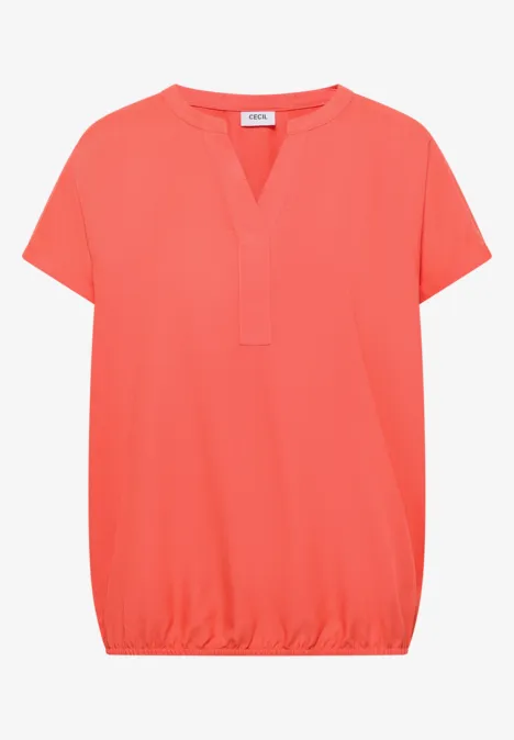 Korallfarbenes Damen-Shirt mit kurzen Ärmeln, V-Ausschnitt und elastischem Saum.