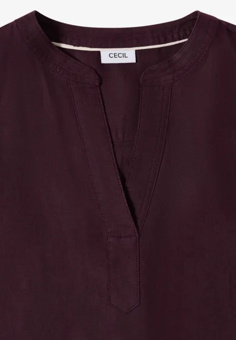 Dunkelviolettes Top mit V-Ausschnitt und schlichter Passform, Etikett 'CECIL' im Nacken.