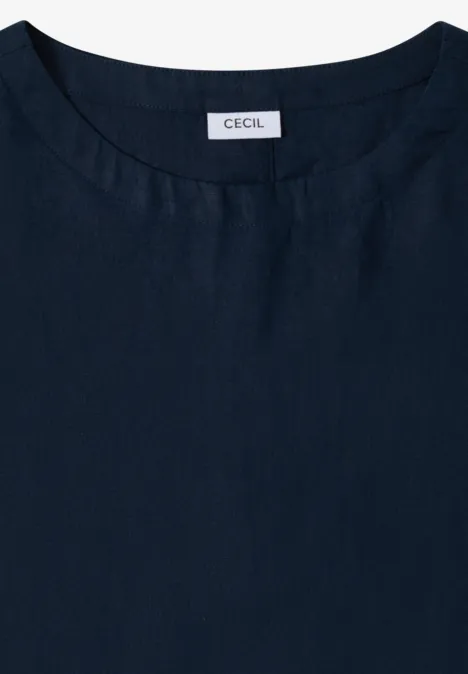 Haut sans manches bleu marine à encolure ronde, étiquette CECIL discrète dans la nuque.