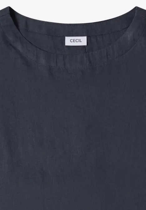 Top féminin gris foncé à col rond en tissu légèrement texturé, style épuré.