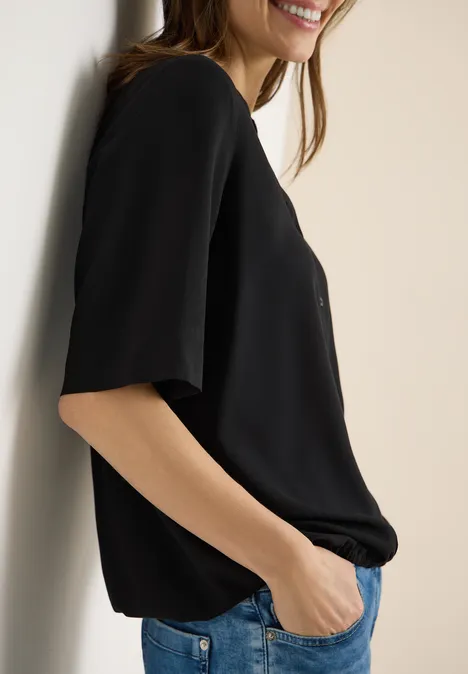 Blouse avec col fendu et ourlet élastique Black Blouse avec col fendu et ourlet élastique Black