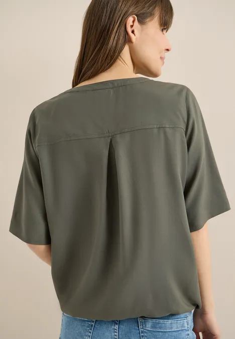 Blouse avec col fendu et ourlet élastique khaki Blouse avec col fendu et ourlet élastique khaki
