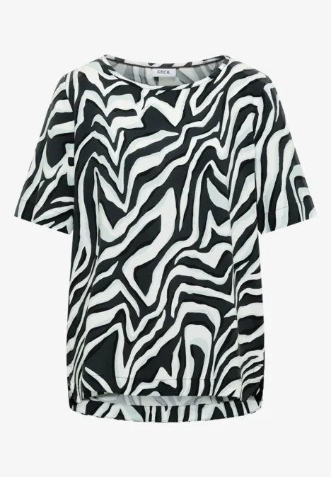 Witte top met zwart zebrapatroon, losse pasvorm, ronde hals en korte mouwen.