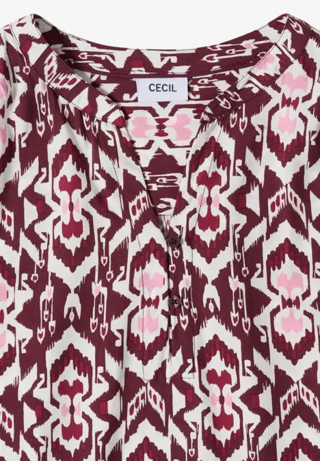 Damenbluse mit pink-weißem Ikat-Muster, V-Ausschnitt und lockerem Schnitt von CECIL.