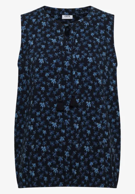 Haut sans manches bleu foncé à imprimé fleuri bleu et lien à nouer avec pompons.