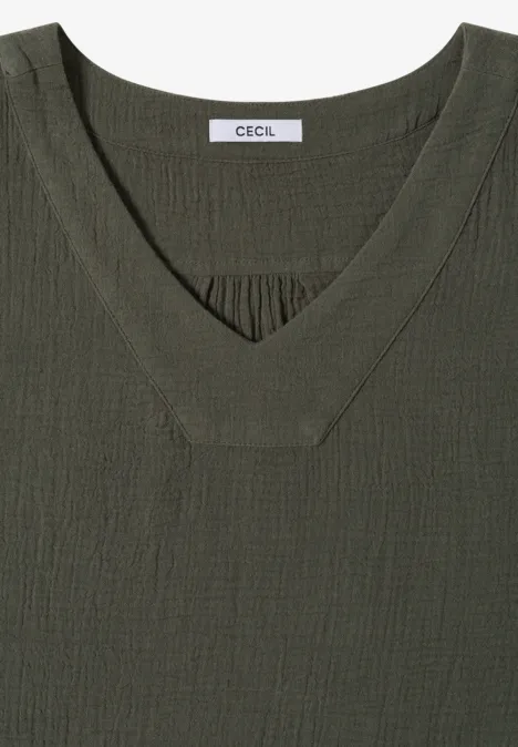 Olivgroen V-hals T-shirt van gestructureerde stof met ‘CECIL’-label in de nek.