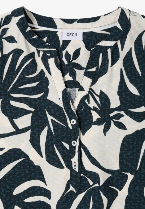 Leichte Bluse mit dunkelblauem Blattmuster, halbe Knopfleiste und Rundhalsausschnitt.
