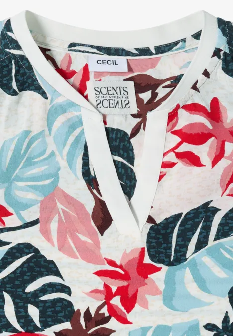 Weißes Damenoberteil mit buntem Blatt- und Blumenmuster in Rot, Blau und Rosa.