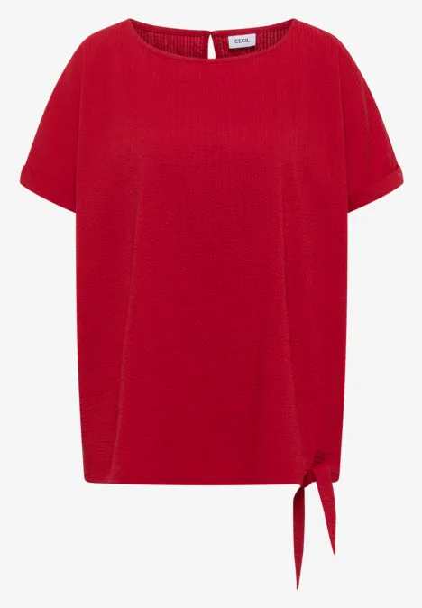 Blouse met ronde hals en knoopdetail tamarillo red Rode top met korte mouwen, ronde hals en zijstrikdetail onderaan.