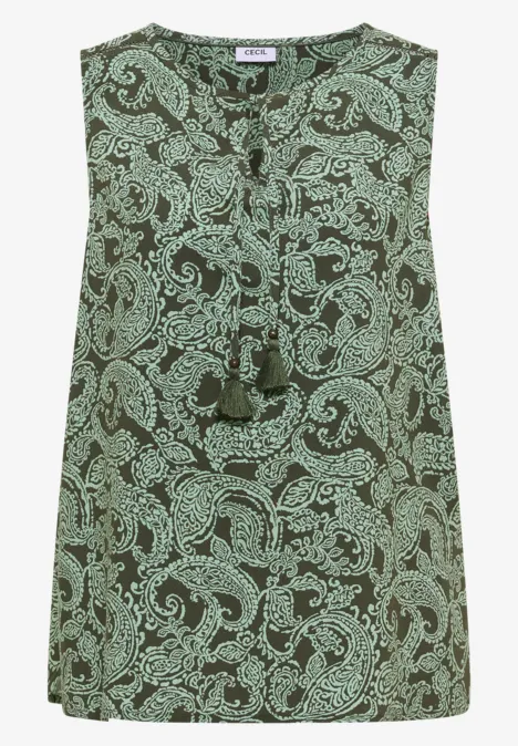 Ärmelloses, grünes Top mit Paisley-Muster und Quasten am V-Ausschnitt.