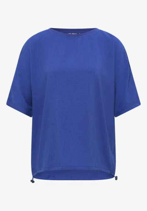 Chemisier à épaules tombantes, couleur unie deep river blue Blaue, kurzärmelige Bluse mit rundem Ausschnitt und Tunnelzug am Saum.