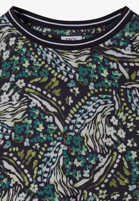 Schwarzes Shirt mit abstraktem Muster aus weißen Linien und kleinen türkis-grünen Blüten.
