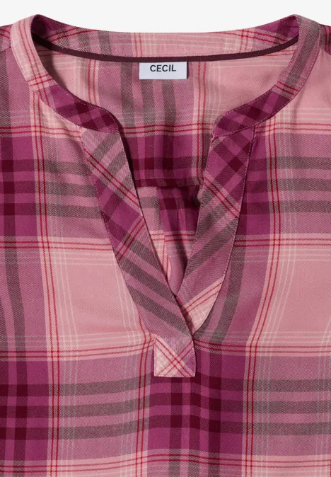 Damenbluse mit rosa-karierter Musterung, ärmellos und V-Ausschnitt.