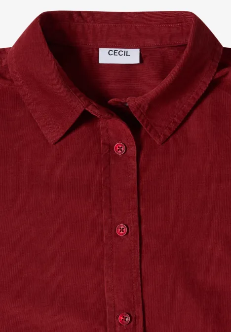 Chemisier à manches longues en velours côtelé russet red Chemise bordeaux à col pointu et patte de boutonnage, étiquette 'CECIL' à l’encolure.