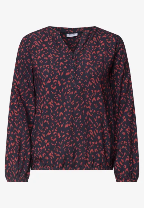 Tunique à manches longues, à col fendu et imprimé urban dark blue Blouse bleu foncé à motifs abstraits rouges, col V et manches longues à poignets élastiqués