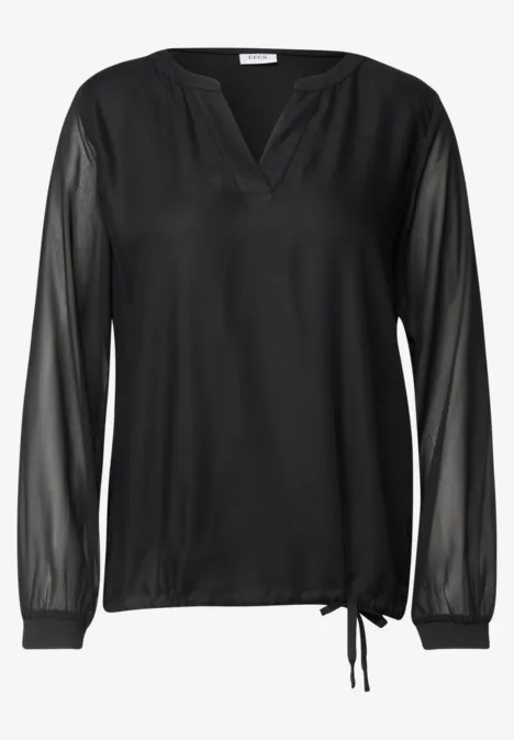Langarm Bluse mit V-Neck und Strukturmix Black Schwarze Bluse mit transparenten Ärmeln, V-Ausschnitt und seitlicher Knotenbindung.