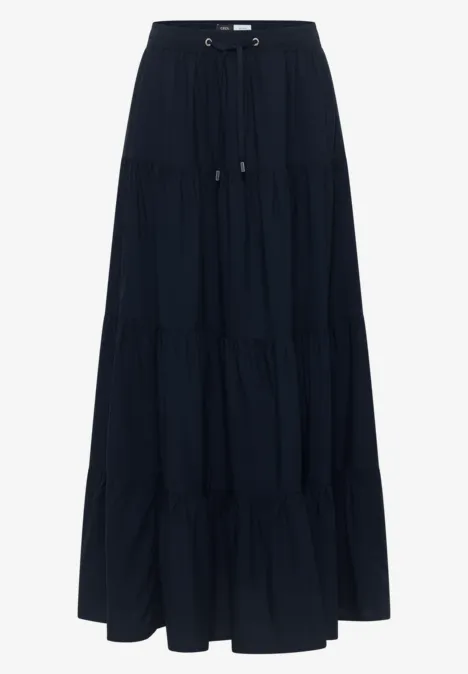 Jupe longue bleu marine à volants en tissu léger avec taille élastiquée et cordon de serrage.