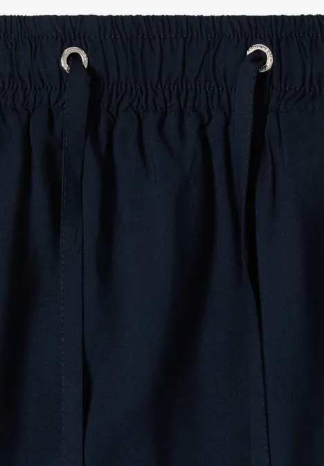 Pantalon bleu marine avec taille élastique et cordons ajustables passant par des œillets argentés