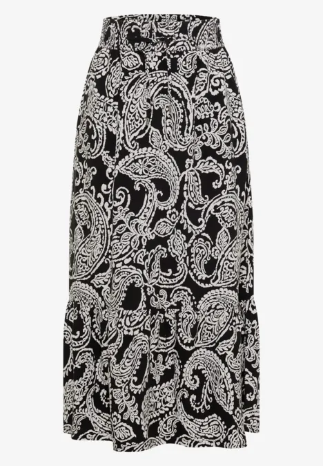 Schwarzer Maxi-Rock mit weißem Paisley- und Blumenmuster, fließender Stoff, elastischer Bund.