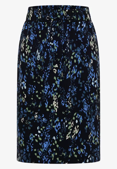 Knielanger Rock mit Elastikbund und Print urban dark blue Schwarzer, knielanger Rock mit blau-grünem Blumenmuster.