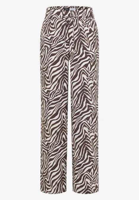 Schwarz-weiße Zebramusterhose mit geradem Schnitt und hohem Bund.