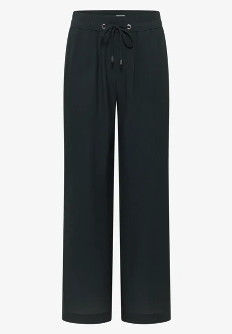 Schwarze, locker sitzende Hose mit weitem Bein und Kordelzug in der Taille.