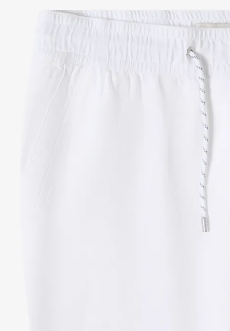 Weiße Jogginghose mit elastischem Bund, Kordelzug und Taschen.
