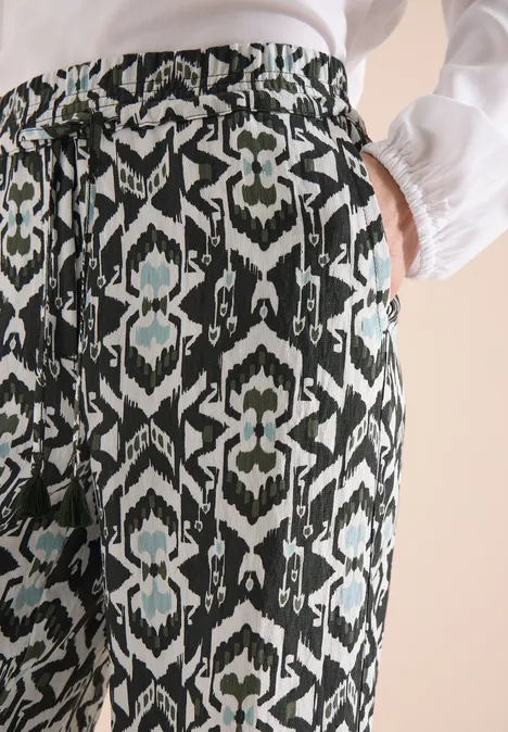 Broek met wijde pijpen in Loose Fit met print khaki