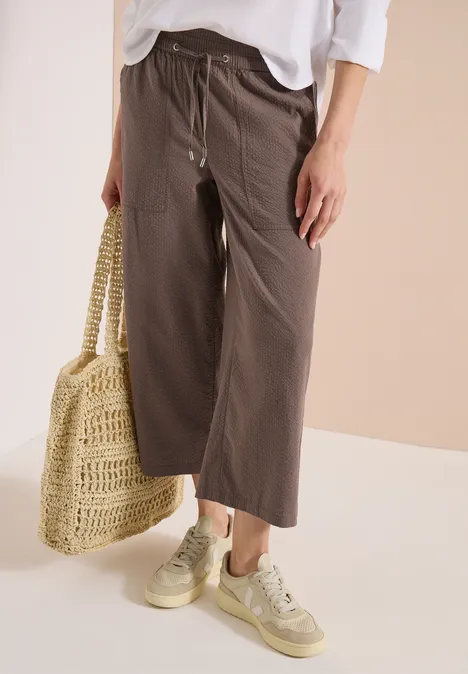 Braune, weite Damenhose mit hohem Bund und Kordelzug