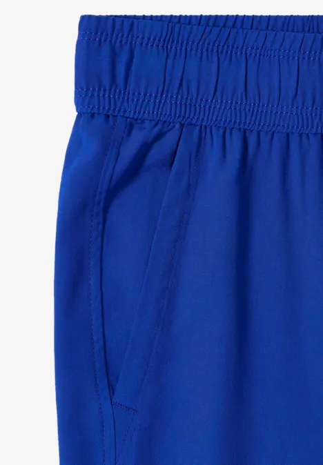Felblauwe sportbroek met elastische tailleband en zijzak.