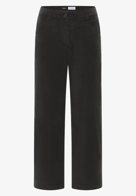Pantalon noir à coupe décontractée, jambe large et taille mi-haute.