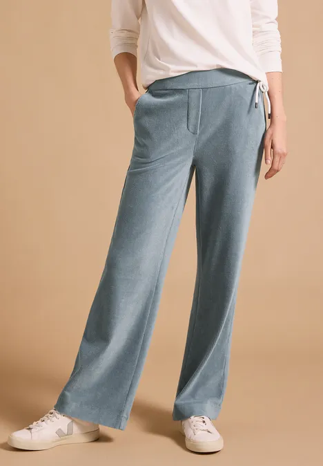 Spodnie z wysokim stanem i prostymi nogawkami w kroju Loose Fit dove blue Jasnoniebieskie, szerokie spodnie z miękkiego materiału, ze sznurkiem w talii i bocznymi kieszeniami.
