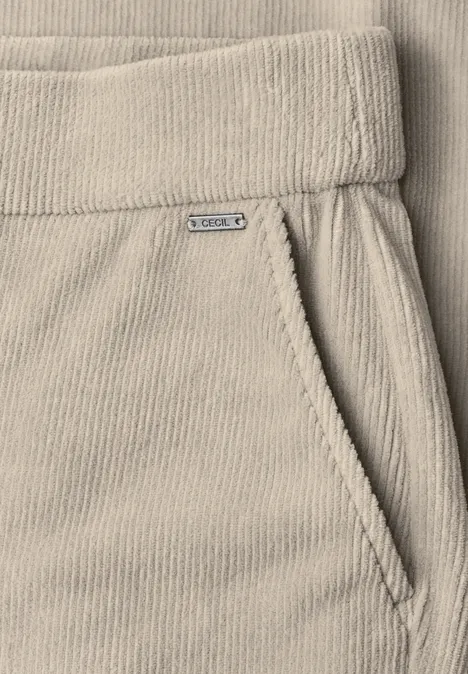 Spodnie z wysokim stanem i prostymi Straight Leg nogawkami o Loose Fit kroju silvery beige Beżowe spodnie sztruksowe z elastycznym pasem i boczną kieszenią.