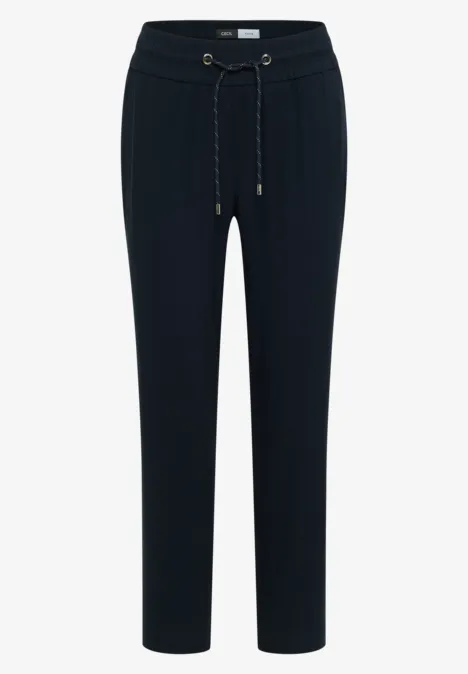 Pantalon Mid Waist Slim Leg en coupe loose universal blue Pantalon noir long à taille élastiquée et coupe ajustée.