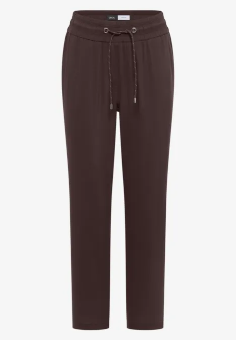 Braune Jogginghose mit Kordelzug und elastischen Bündchen, gerader Schnitt.