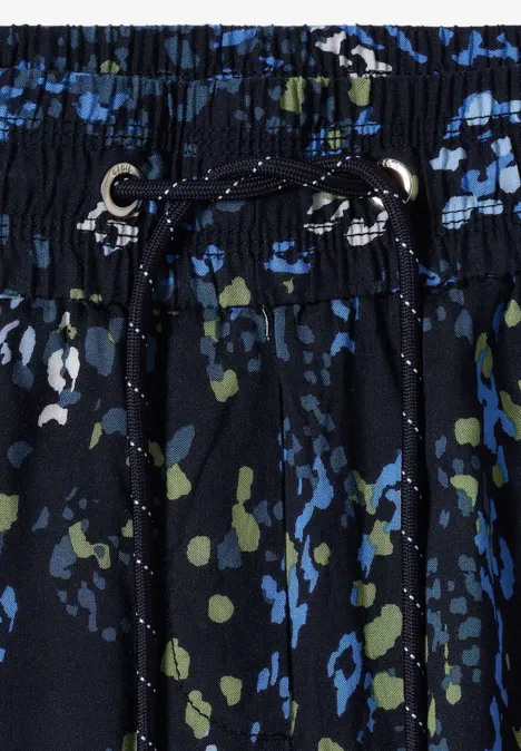 Schwarz-blauer, grüner abstrakter Print auf elastischem Bund mit Kordelzug und Metallösen.