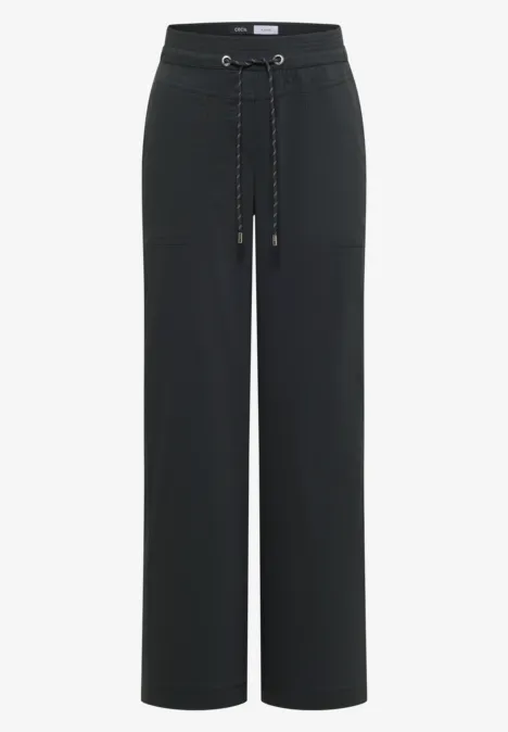Schwarze, weite Hose mit Kordelzugbund und lockerem Schnitt.