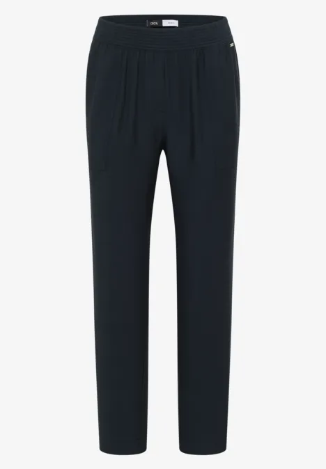 Mid Waist Slim Leg Hose im Loose Fit palm breeze green Schwarze Hose mit elastischem Bund, geradem Schnitt und lässiger Passform.
