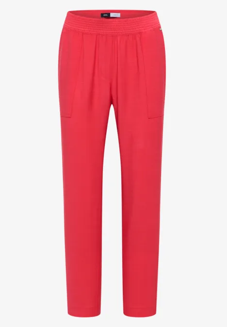 Mid Waist Slim Leg Hose im Loose Fit coral Rote Damenhose mit elastischem Bund und geradem Schnitt.