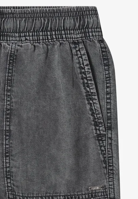 Grijze spijkerbroek met elastische taille en zijzak, verweerd uiterlijk