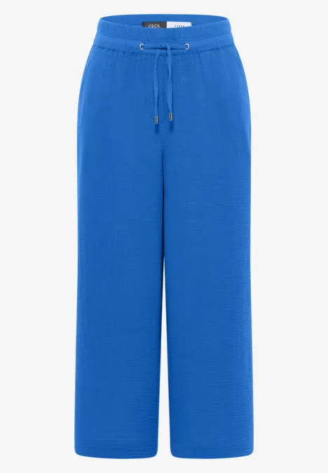Royalblaue, weite Damenhose mit Tunnelzugbund und weitem Bein.