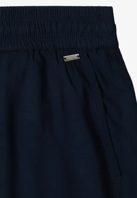 Dunkelblaue Freizeithose mit elastischem Bund und Seitentasche.