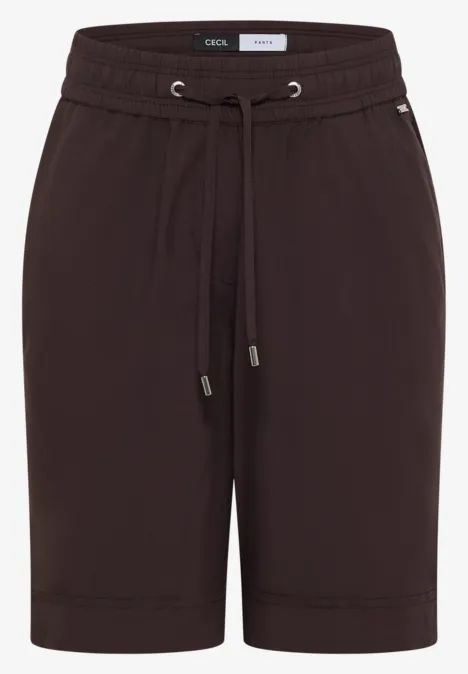 Braune, knielange Freizeit-Shorts aus Jerseystoff mit Tunnelzug und seitlichen Eingrifftaschen.